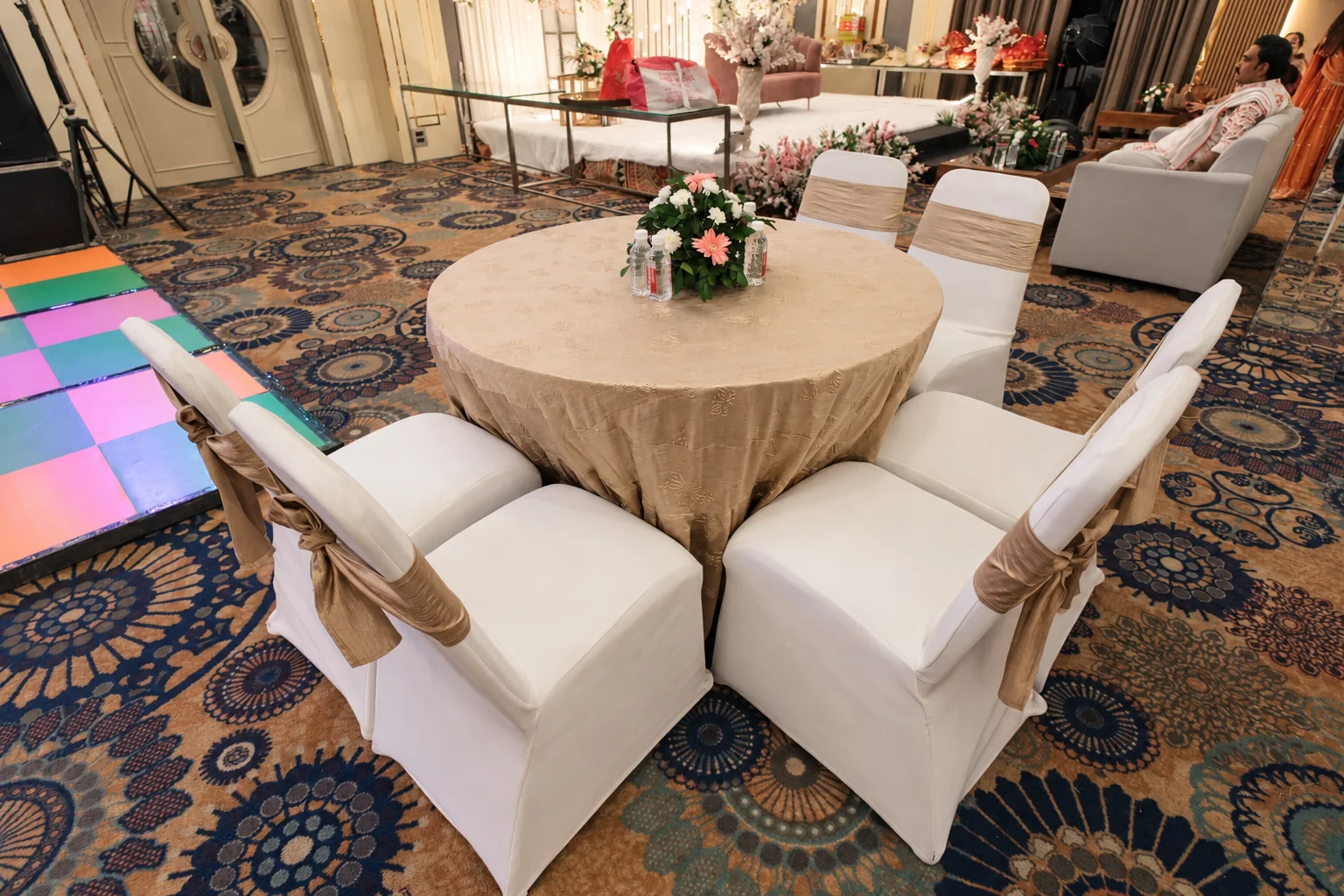 Round-table celebration setup at Hotel Ranbirs